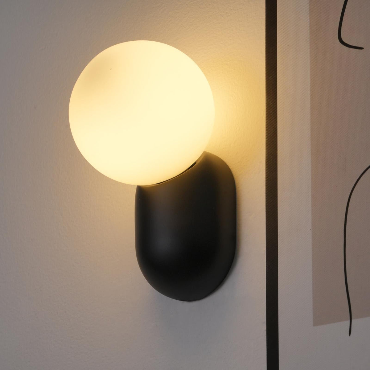 Nelo Minimalist Globe Wall Sconce
