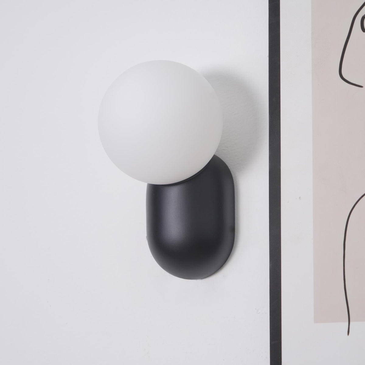 Nelo Minimalist Globe Wall Sconce