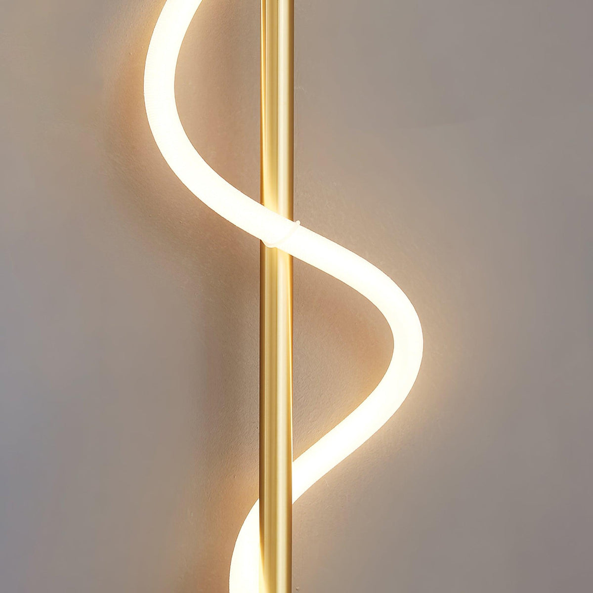 Nivelo Sculptural Brass Silicone Wall Lamp