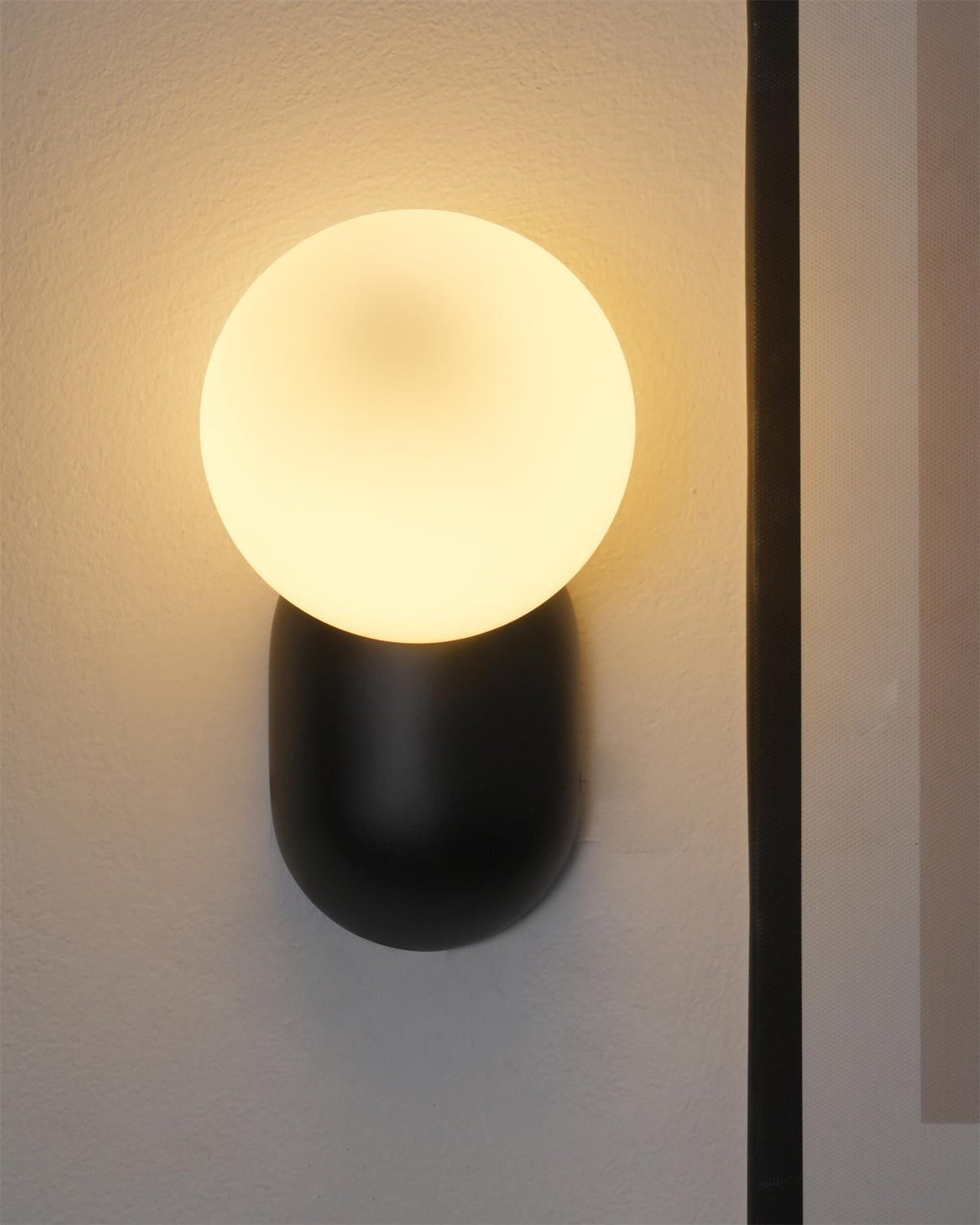 Nelo Minimalist Globe Wall Sconce