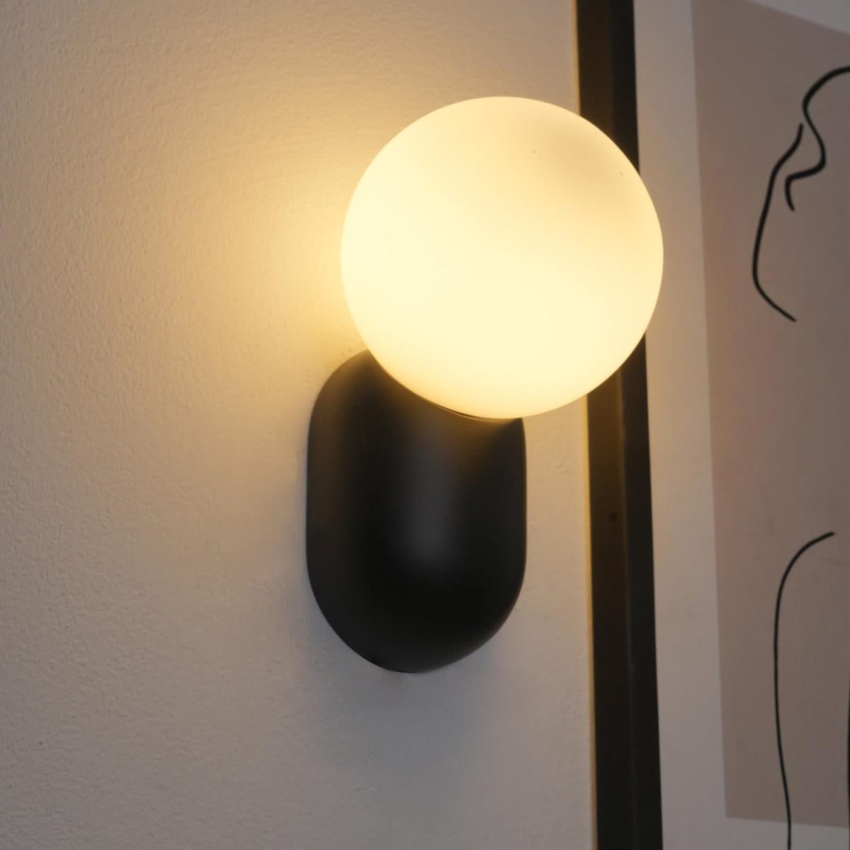 Nelo Minimalist Globe Wall Sconce